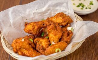 Hombre dispara contra su papá en EU por llevarle orden incorrecta de alitas