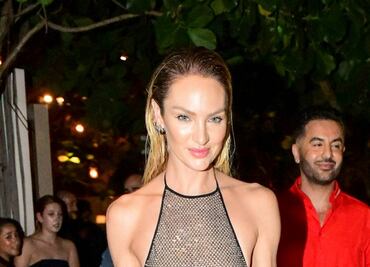 Candice Swanepoel sorprende con braless en revelador vestido de red